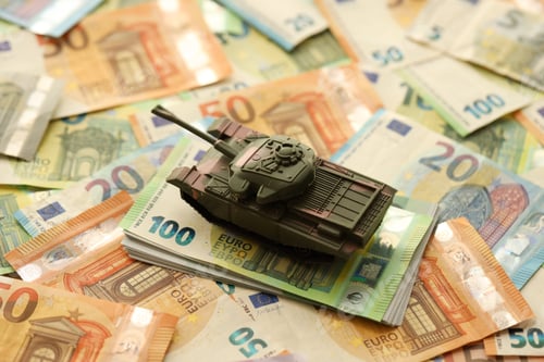 Preview: Many euro banknotes and tank. Lot of bills of European union currency and green tank