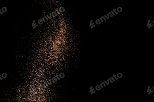 Preview: Cocoa powder sifting isolated on black background. Chocolate dust on black background. Copy space
