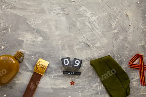 Preview: Victory Day Composition with Military Items on Grey