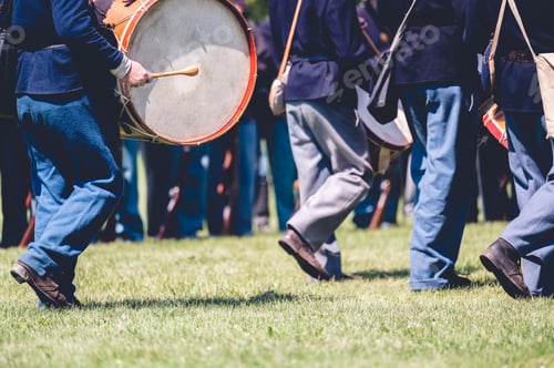 Preview: Veterans marching and playing musical instruments in a field reenacting the American Civil War.