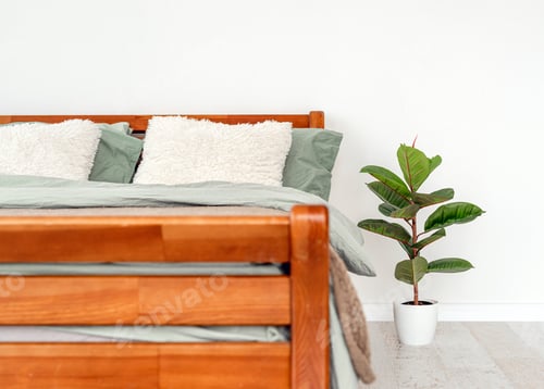 Preview: Wooden bed in interior