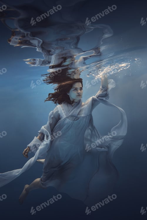 Preview: Portrait Of A Girl In A Blue Dress Under Water
