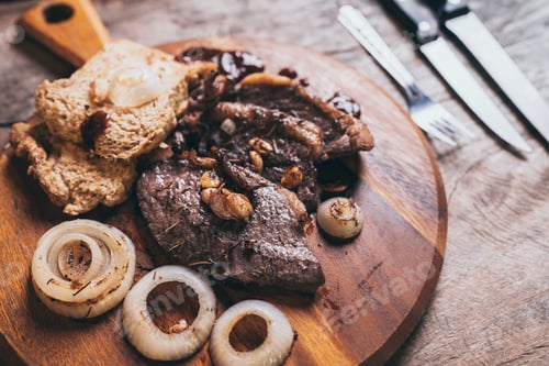 Preview: bbq beef steak with onion and pepper, grilled meat with salt and rosemary, beefsteak