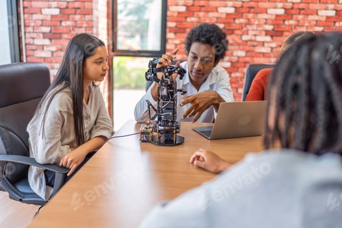 Preview: Teenager children learning with new innovation robotic hand interface hand control in classroom
