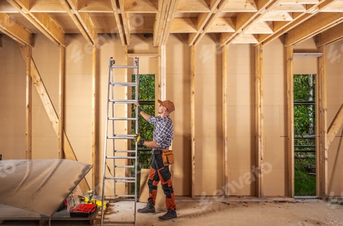 Preview: Caucasian Construction Contractor Moving Aluminium Ladder