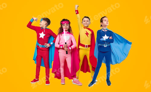 Preview: Team of children in superhero costumes in studio