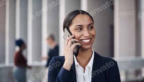 Preview: Shot of a young businesswoman using a smartphone against a city background