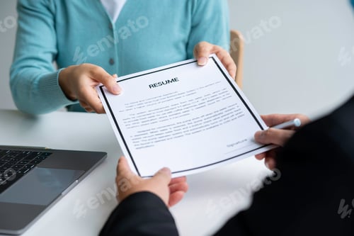 Preview: Human resources manager conducting job interview with applicant in the office, Candidate with resume