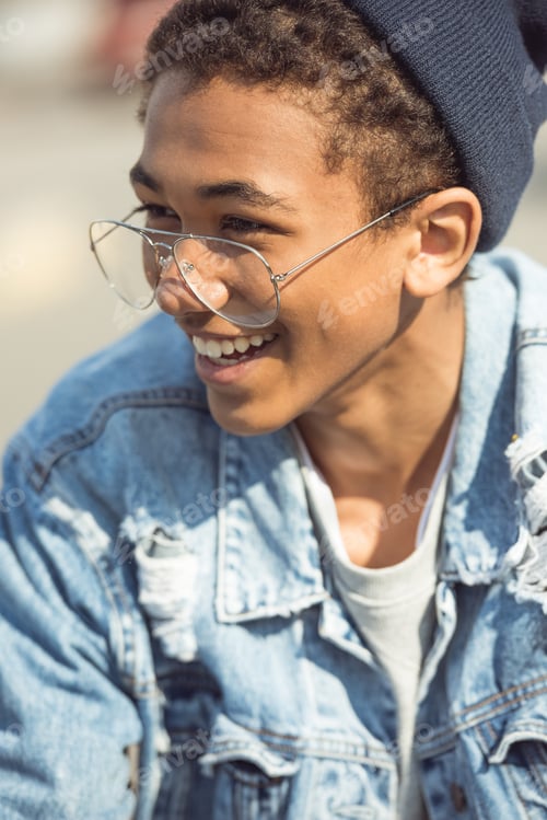 Preview: Portrait of Smiling Teenage Boy, Hipster Style Concept