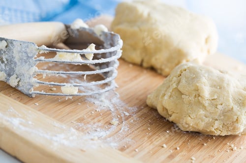 Preview: Preparing Homemade Dough with Pastry Cutter on Wood