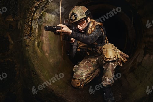 Preview: Serious woman performing task in extreme conditions
