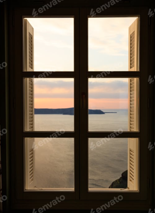 Preview: Beautiful sunset over sea water - window view
