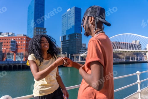 Preview: Young african american women in the city, lifestyle concept friends, greeting from colleagues
