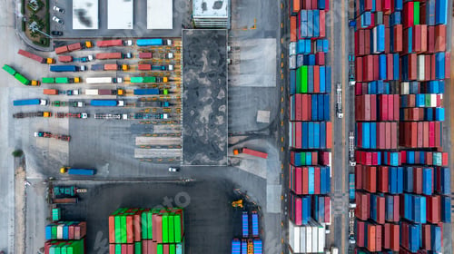 Preview: Aerial view semi trailer trucks stand on the parking lot and wait for loading and unloading cargo