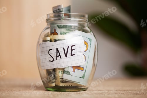 Preview: Glass Jar Full of Money Savings Concept