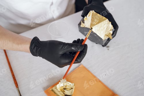 Preview: Man in a white shirt works with a cement