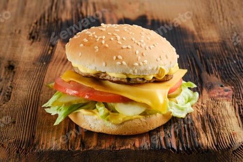 Preview: Beef cheeseburger with vegetables and cheesy sauce