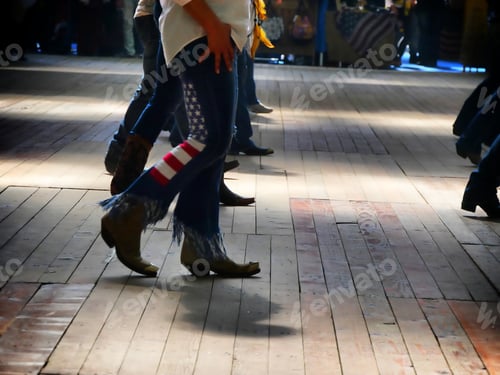 Preview: Western folk music dancer's legs in cowboy boots dancing on a wooden old floor