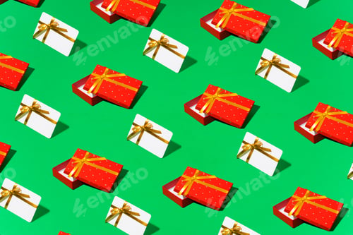 Preview: Red small car transports a pile of gifts on a green background, lettering sale