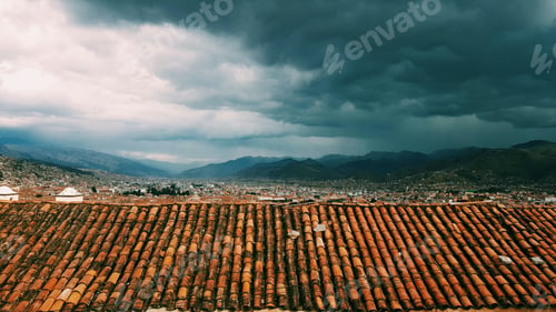 Preview: A city with a large, cloudy sky above it