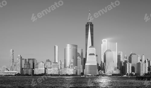 Preview: Black and white photo of Manhattan skyline at sunset, New York City, USA.