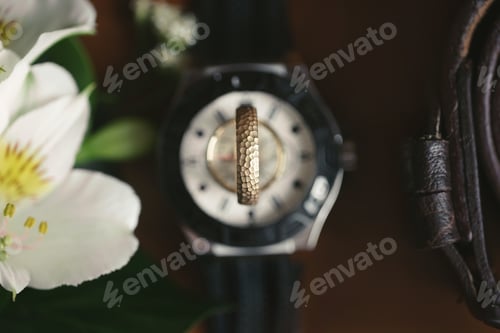 Preview: Wedding Rings on Watch with Floral Accents