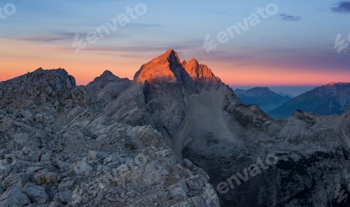 Preview: Mount Jalovec at sunrise glows