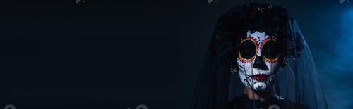 Preview: portrait of woman with closed eyes in spooky halloween makeup and veil on black background with blue