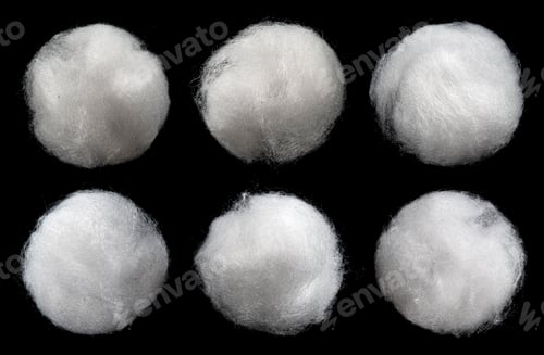 Preview: Balls of fluffy cotton wool isolated on black background