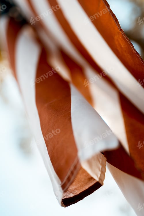 Preview: Close shot of united states flag with blurred background