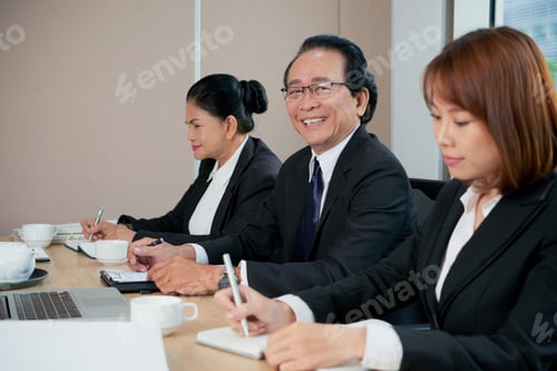 Preview: Businessman attending meeting