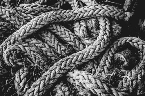 Preview: Closeup greyscale shot of a tangled up marine rope
