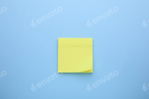 Preview: Paper note on light blue background, top view