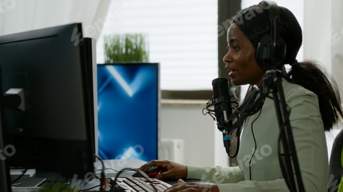 Preview: Sad black woman streamer with headphone losing videogames