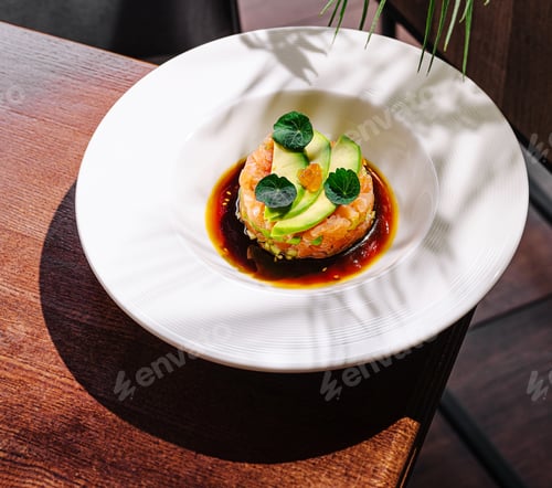 Preview: Fresh seafood dish served on a modern restaurant table with natural light