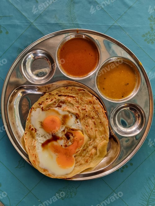 Preview: Roti canai or roti prata with eggs