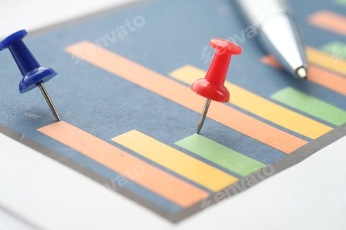 Preview: Close up of bar chart on paper on wooden table