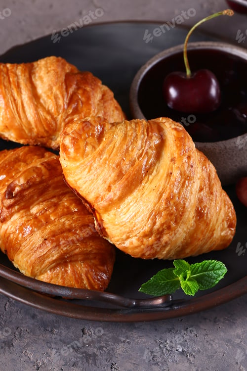 Preview: traditional croissants with jam for breakfast
