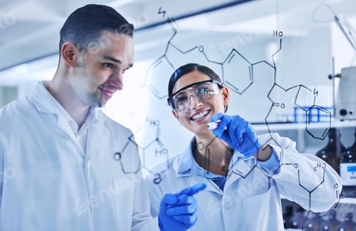 Preview: Cropped shot of two young scientists working on a glass wipe board in their lab