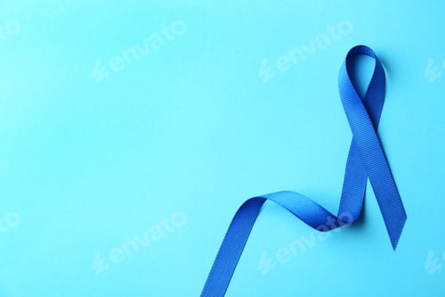 Preview: Blue ribbon on color background, top view with space for text. Colon cancer awareness concept