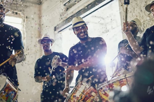 Preview: Portrait of a group of musical performers playing drums together