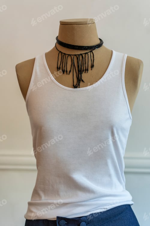 Preview: A mannequin dressed up with a white tank top. Stylish and fashion concept