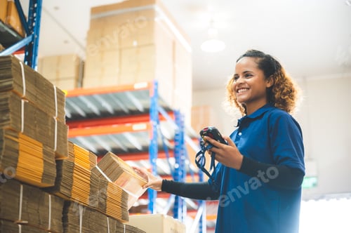 Preview: warehouse worker using bar code scanner to scanning box and analyze newly arrived