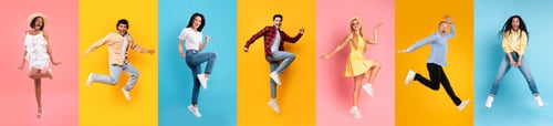 Preview: Carefree diverse people jumping up, celebrating victory and having fun