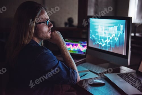Preview: Guy working with computer