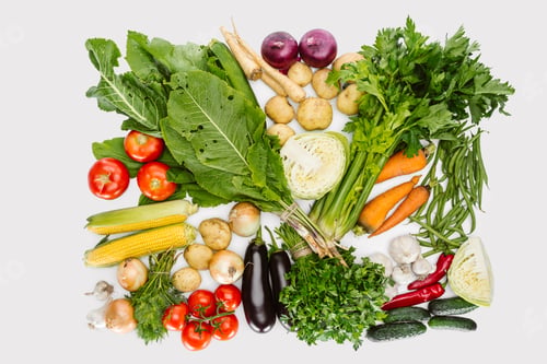 Preview: flat lay with various autumn vegetables arranged isolated on white