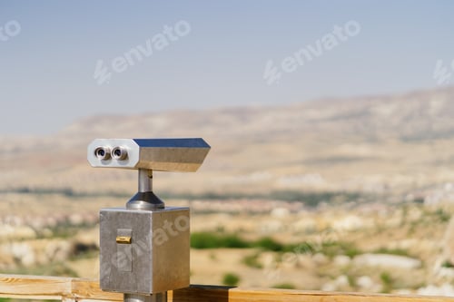 Preview: Mockup binoculars on view point oriented to mountains