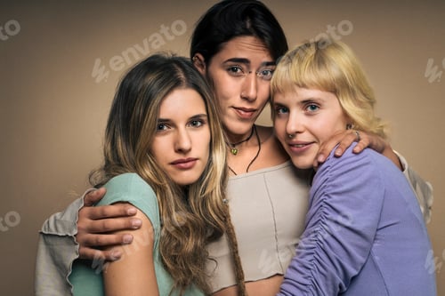 Preview: Close-up portrait of three serious and confident diverse young women.