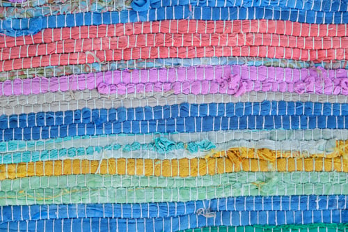 Preview: Close-up of rug woven from colored threads