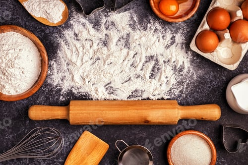 Preview: Ingredients for baking - flour, wooden spoon, rolling pin, eggs